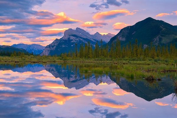 Canada-Alberta-Banff National Park Reflections in lake at sunset